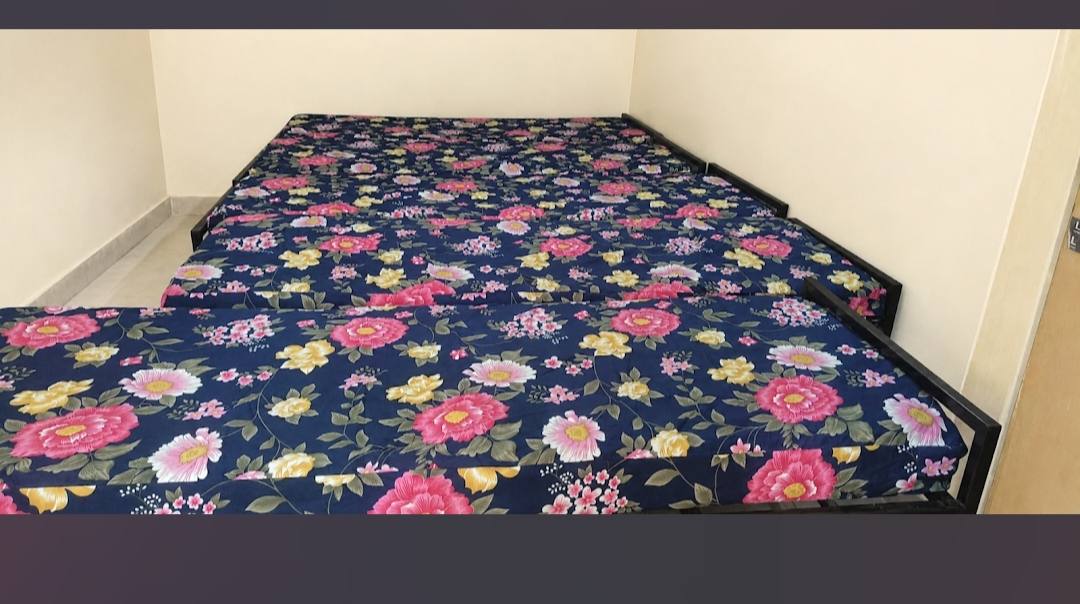Shivom PG shared room with comfortable beds